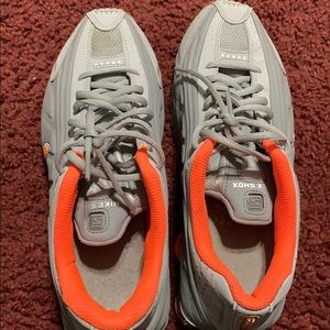 Orange and grey Nike shox